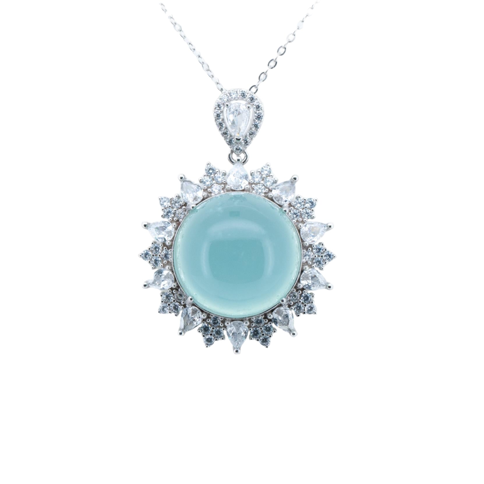 Luxury necklace with a light blue pendant and diamond accents on a white background