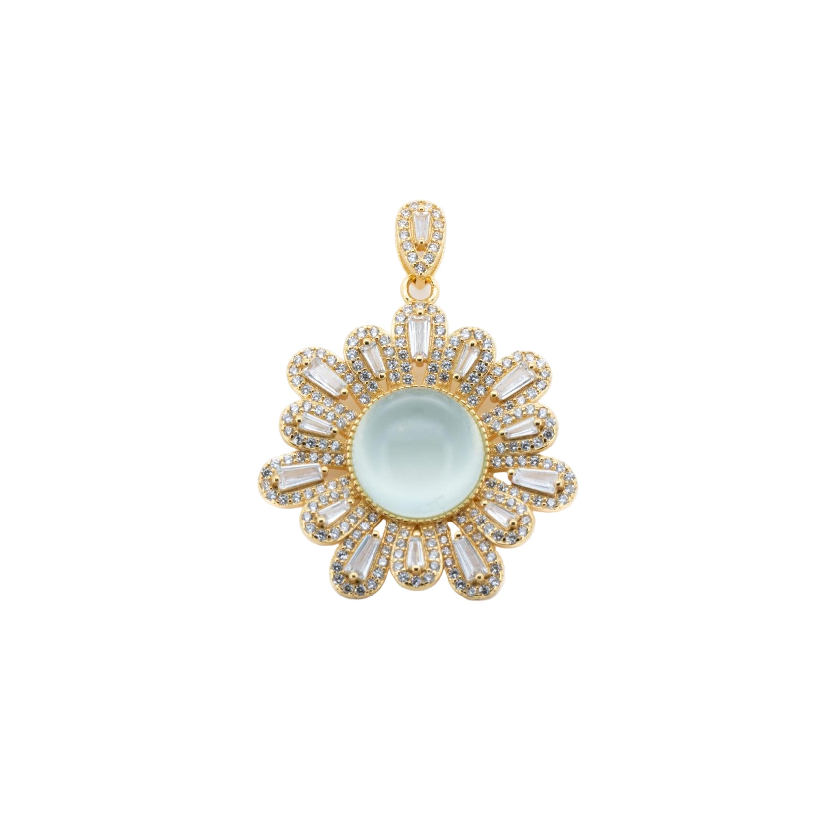 Gold pendant with a central gemstone on a white background