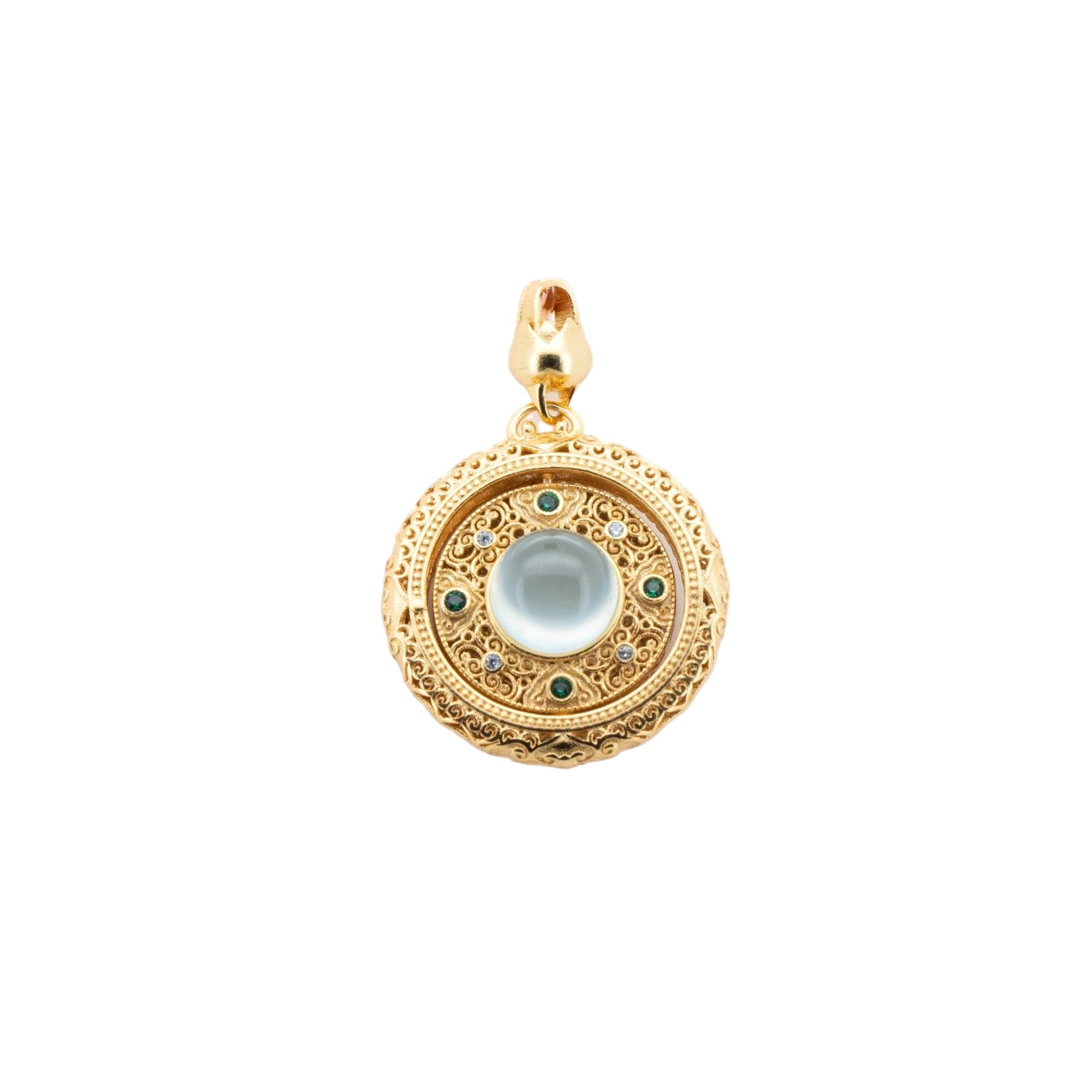 Gold pendant with decorative elements on a white background