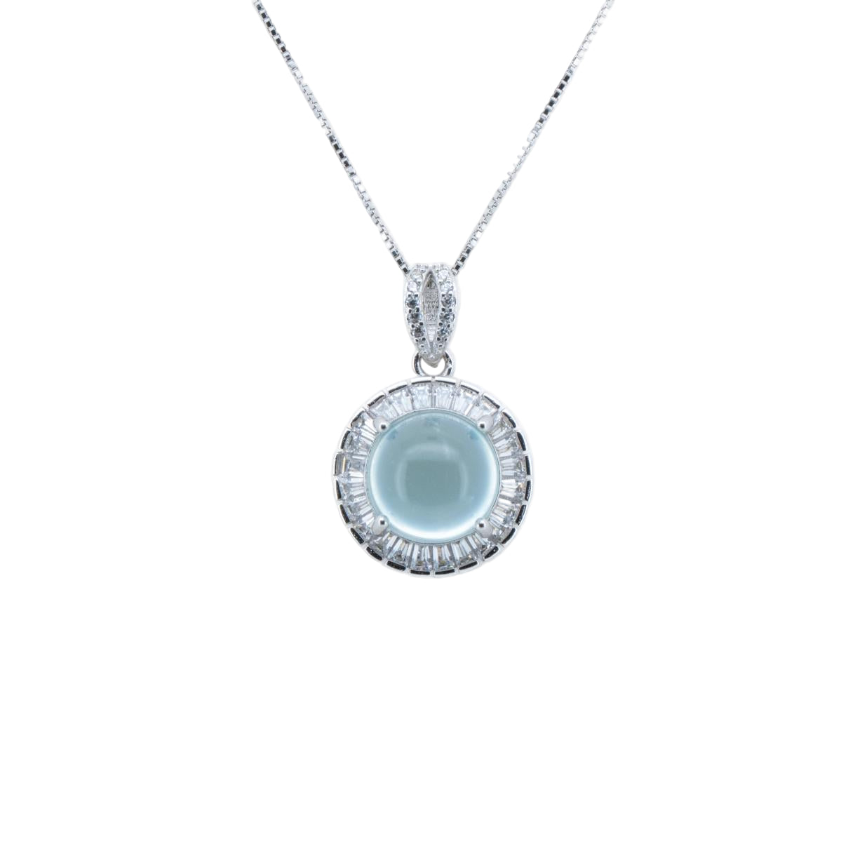Silver pendant with a blue center on a white background