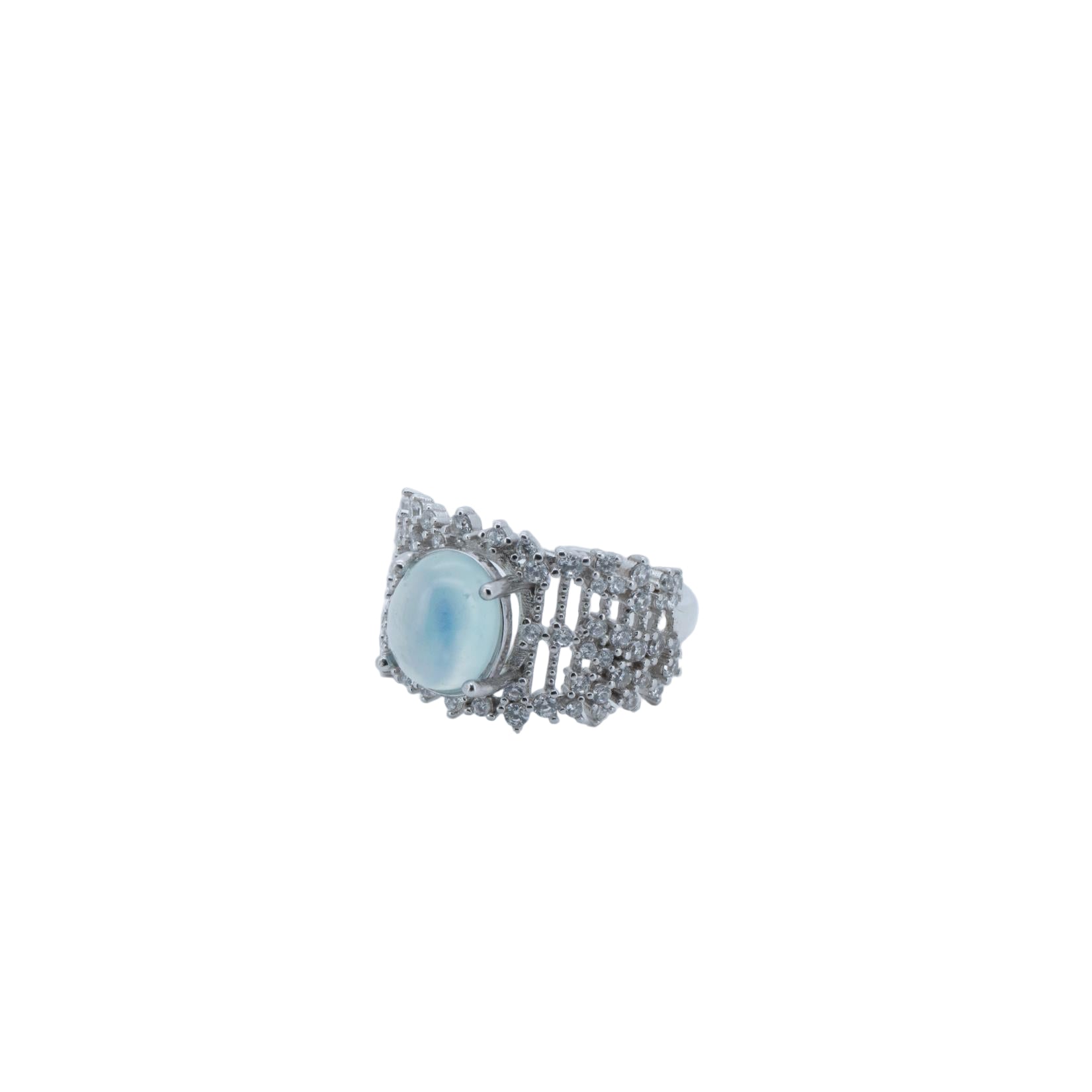 Silver ring with a light blue gemstone on a white background
